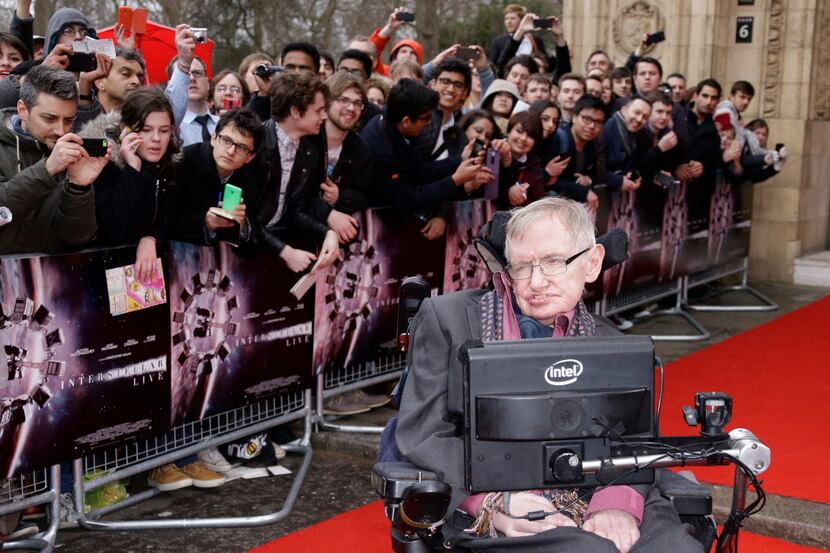 Professor Stephen Hawking poses for photographers upon arrival for the Interstellar Live...