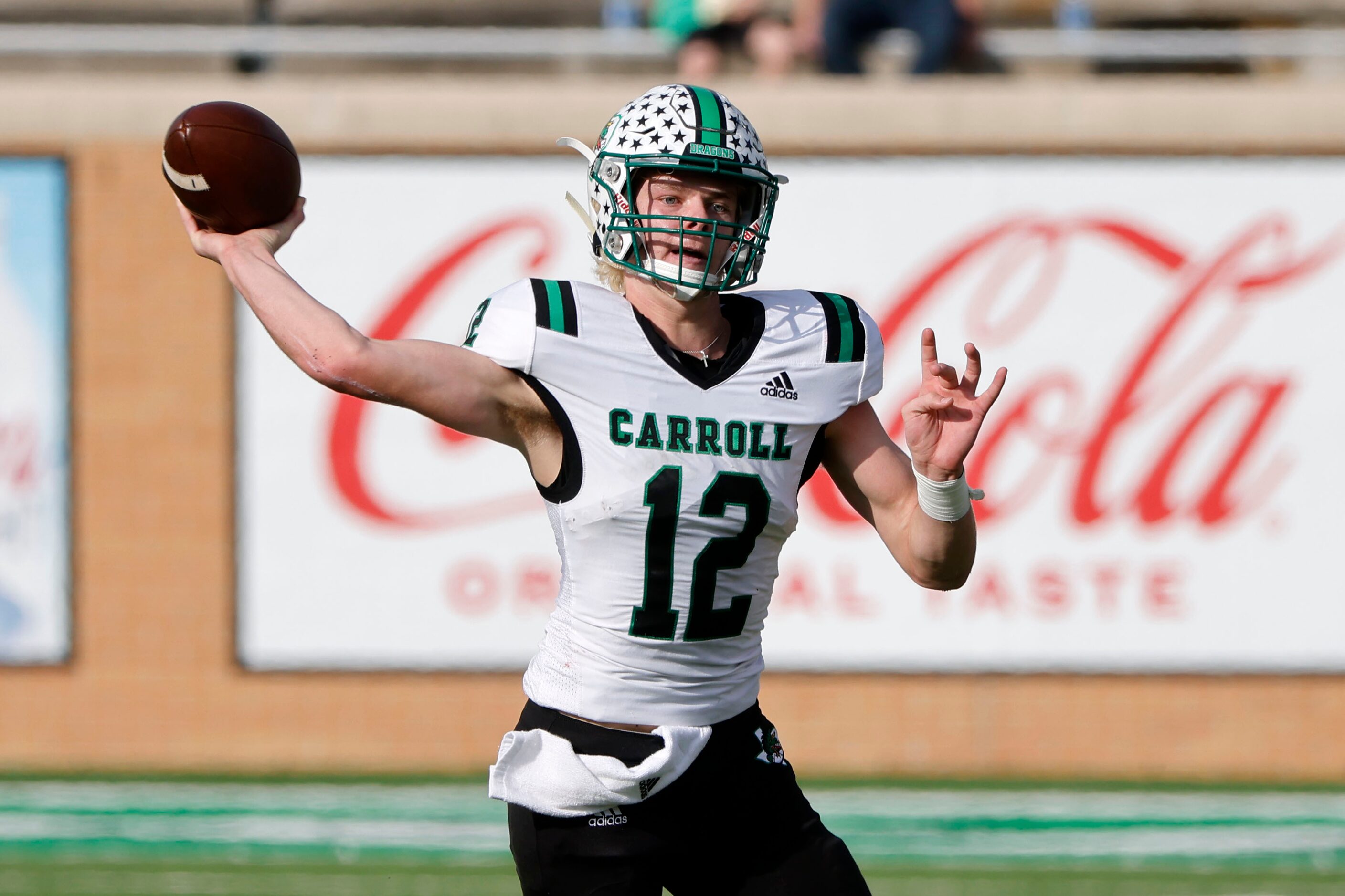 Southlake Carroll quarterback Kaden Anderson (12) throws a pass against Allen during the...