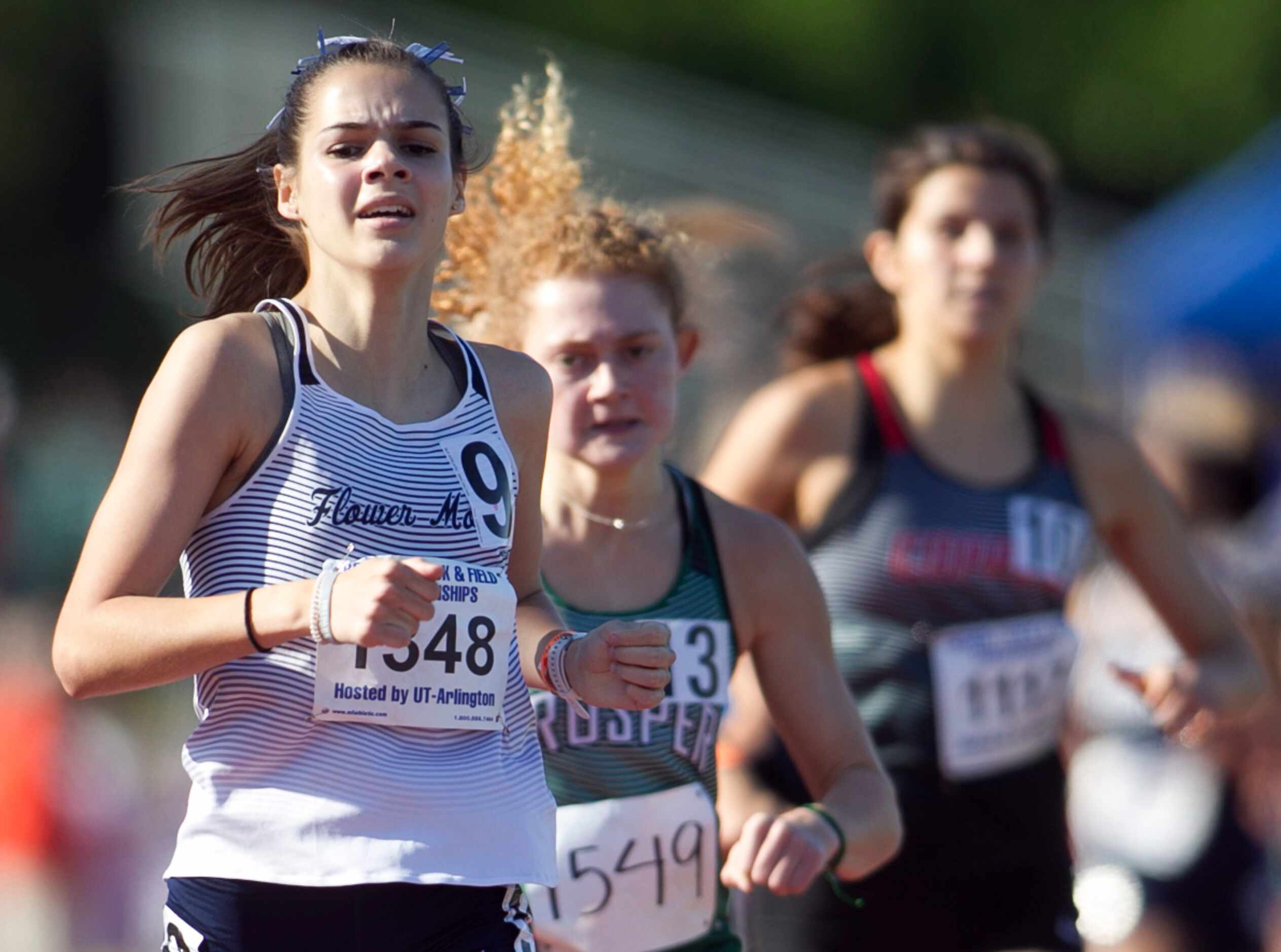 Flower Mound's Nicole Humphries finishes strong to win the Class 6A Girls 800 Meter Run...