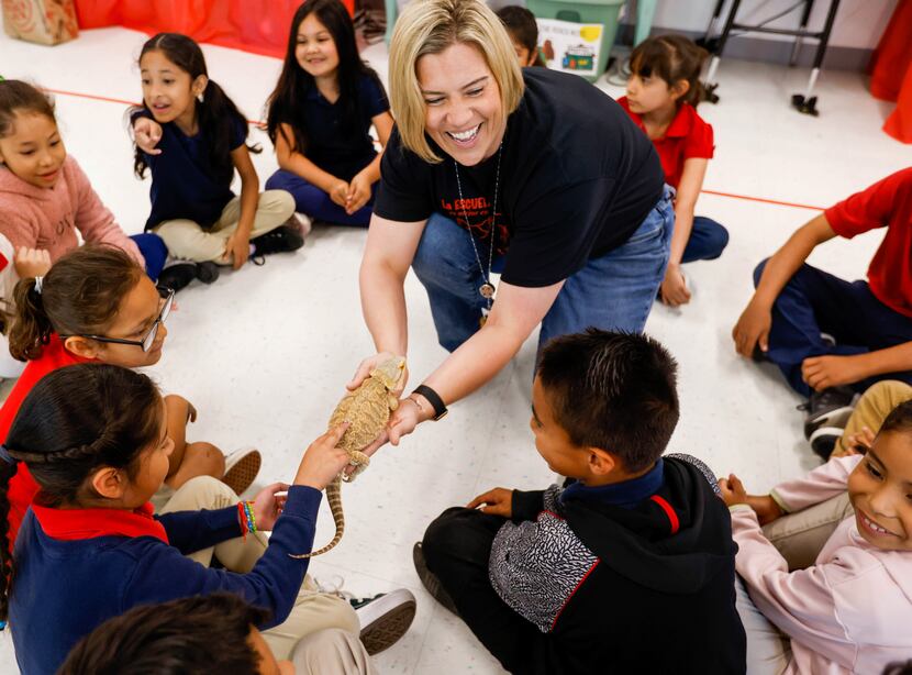 Principal Erika Pasieczny instructs second grade students at Silberstein Elementary on how...