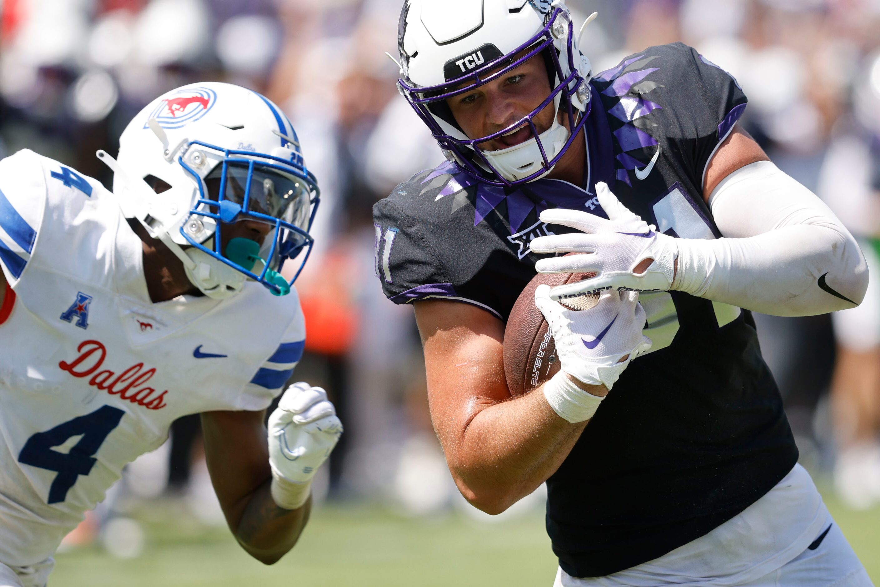 TCU Horned Frogs tight end Chase Curtis (81) runs into the end zone for a touchdown as...