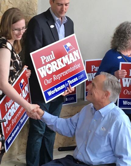 Gov. Greg Abbott urged voters to avoid long lines by casting early votes, as he did Tuesday...