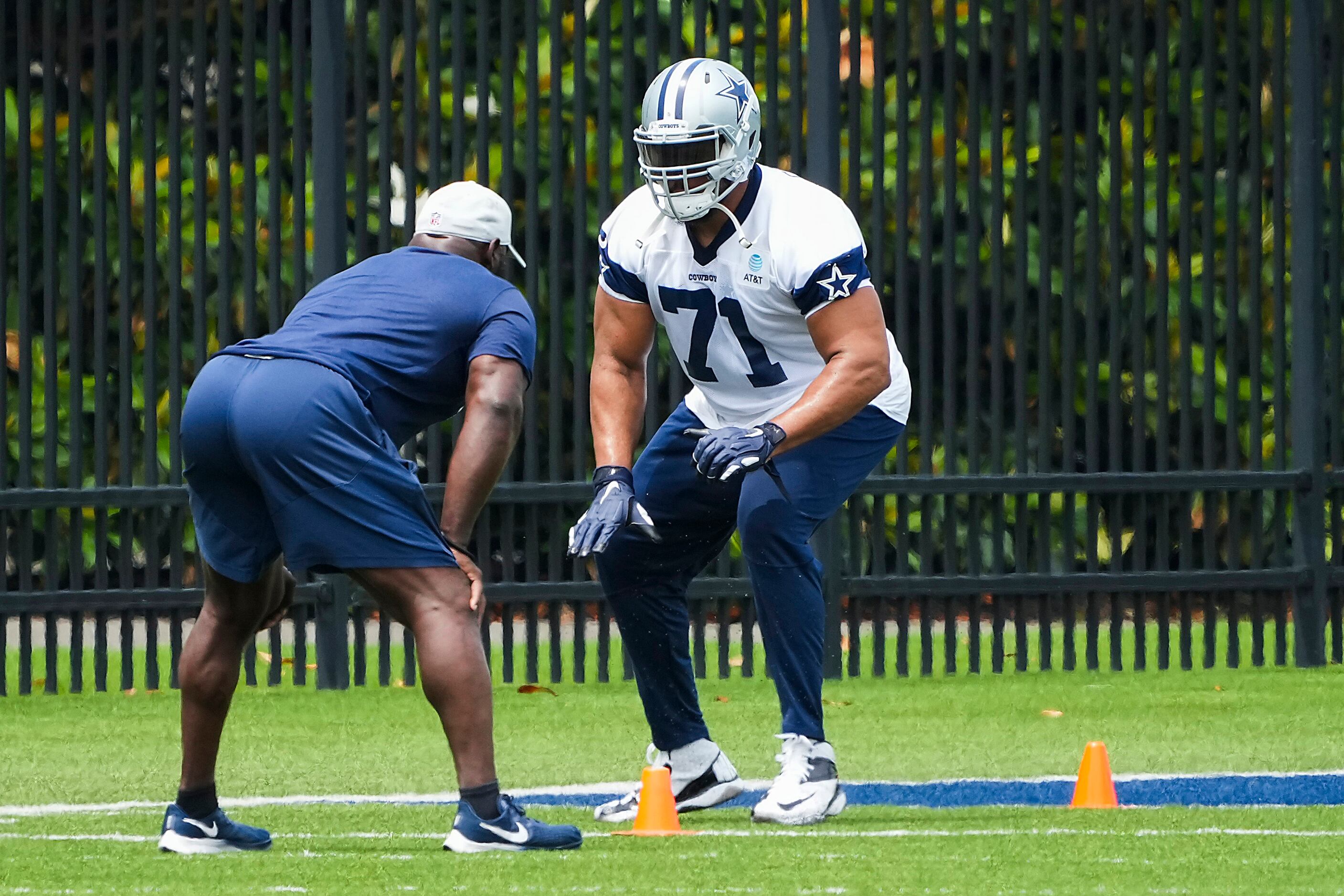 Dallas Cowboys tackle La'el Collins runs a conditioning drill during a minicamp practice at...