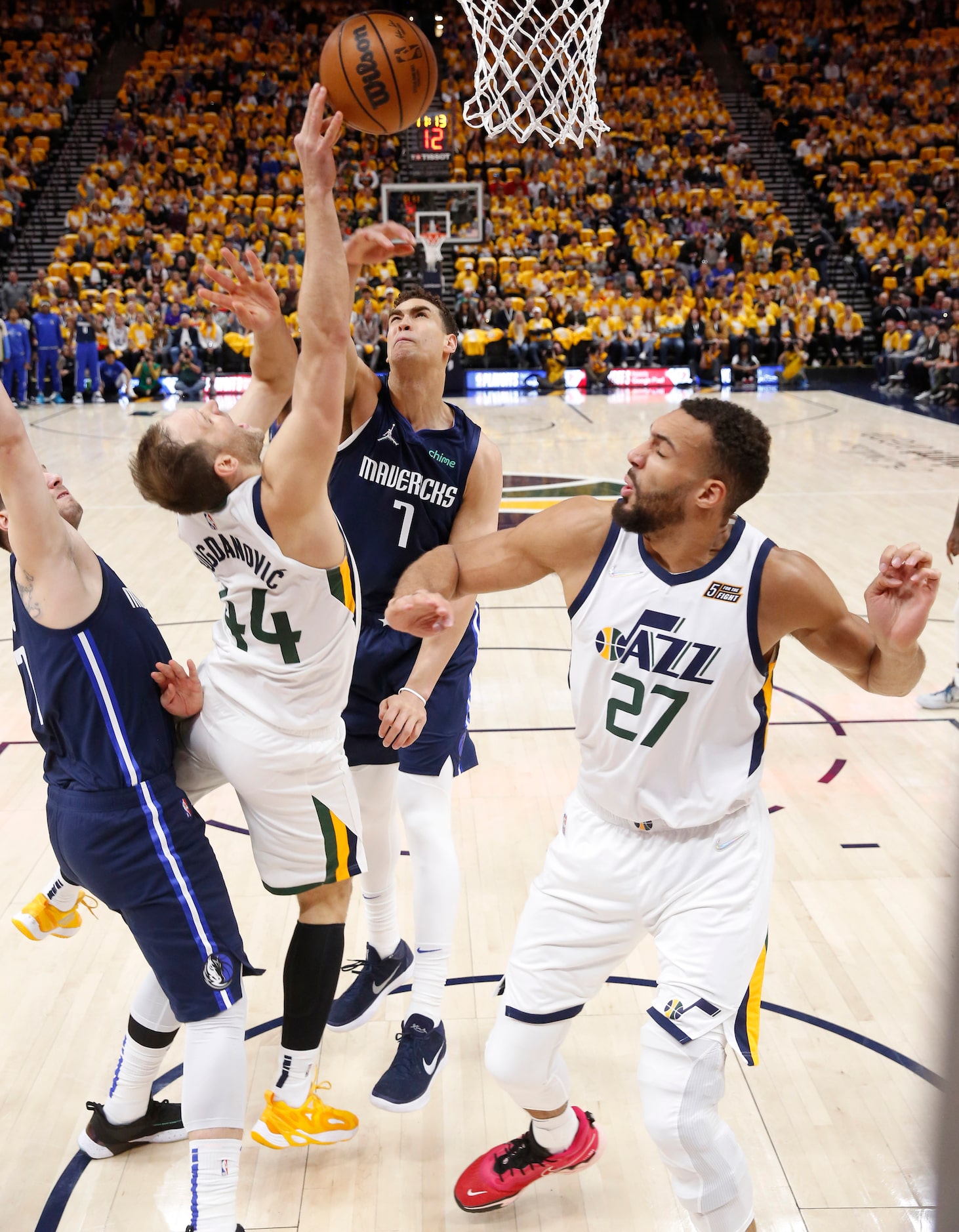 Dallas Mavericks center Dwight Powell (7), Utah Jazz forward Bojan Bogdanovic (44) and Utah...