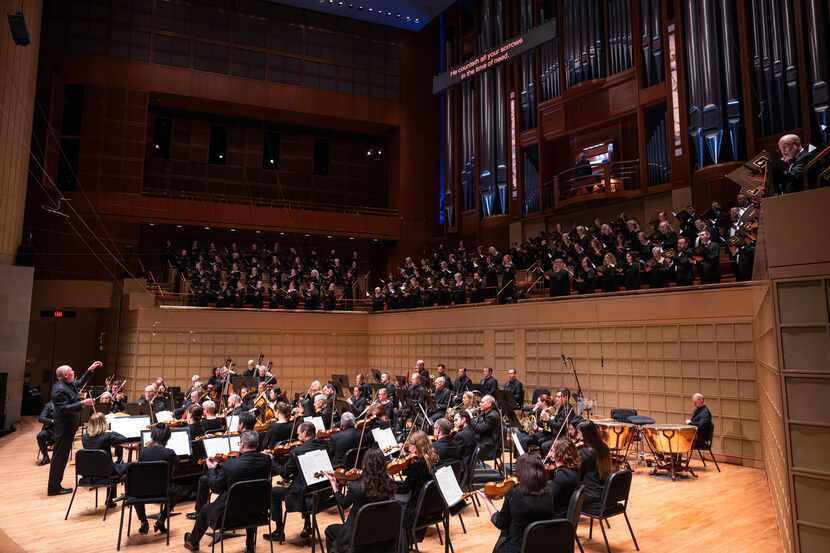 Guest conductor Paul McCreesh, far-left, conducts the Dallas Symphony Orchestra and Dallas...