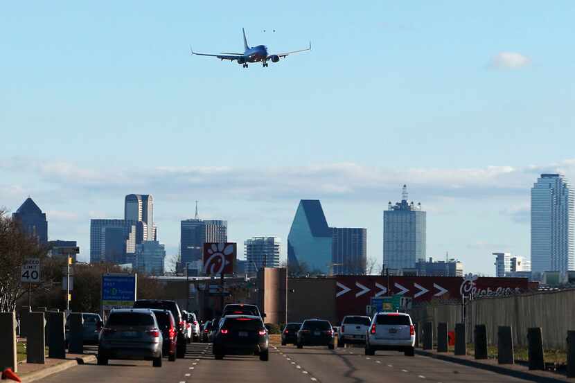 A Southwest Airlines airplane flies into Dallas Love Field Airport in Dallas, on Thursday,...