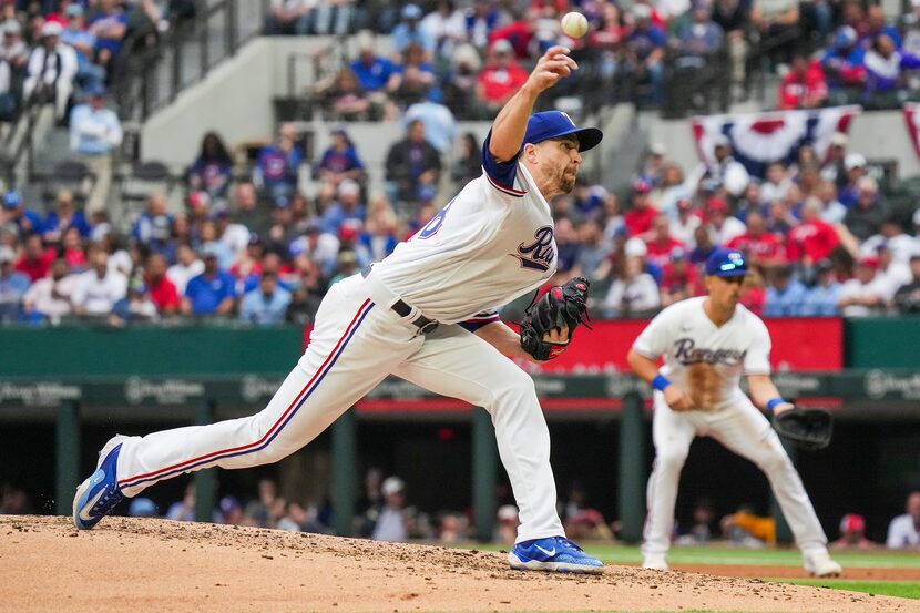 Texas Rangers starting pitcher Jacob deGrom delivers during the third inning of the season...