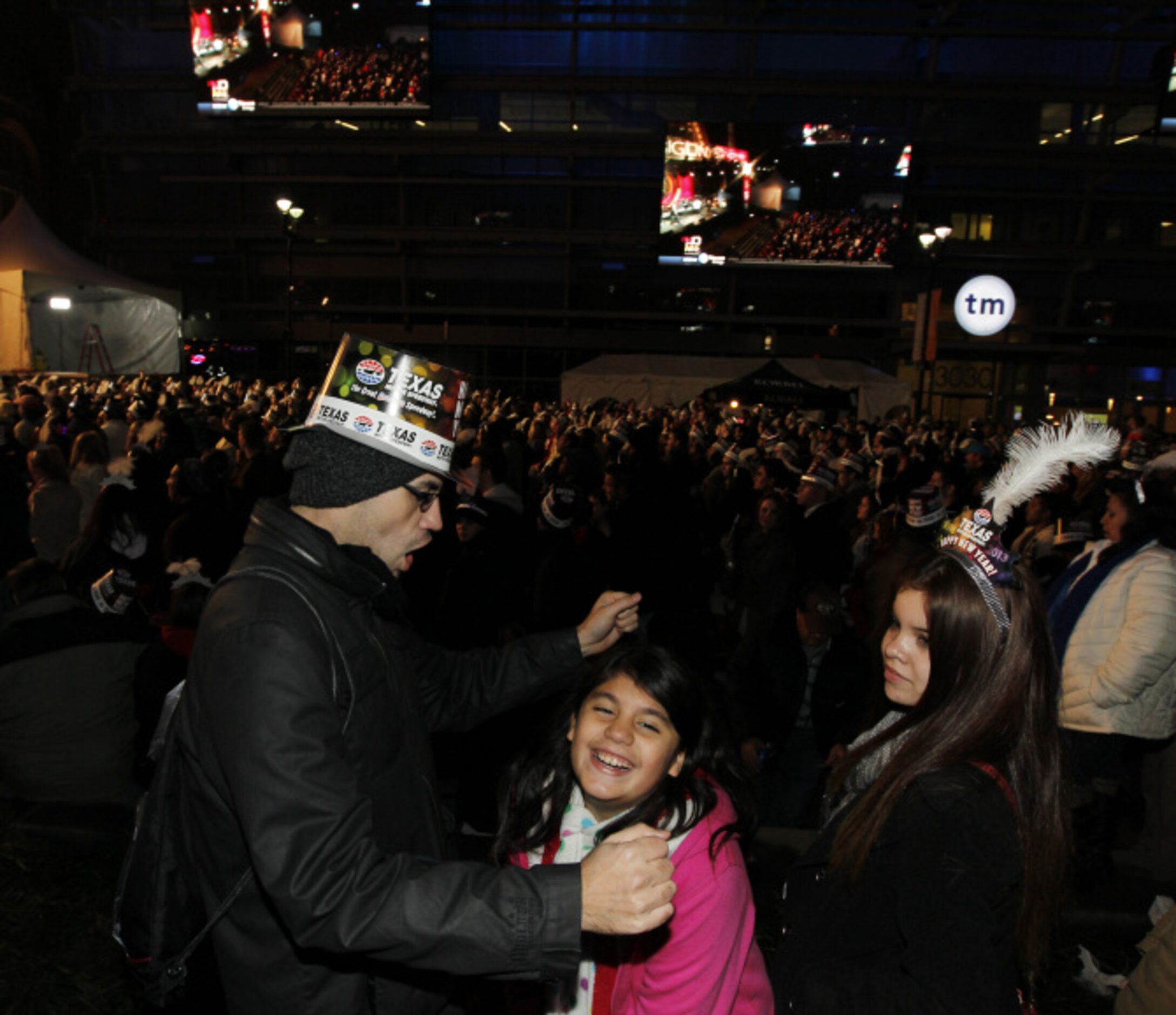 Emmanuel Crandell from Euless dances with his daughter Bethany Crandell, 9, during Big D New...