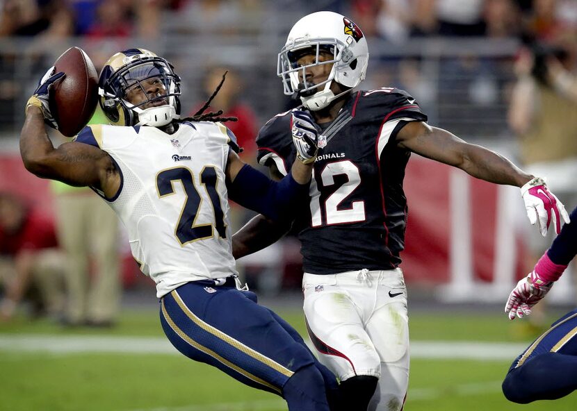 St. Louis Rams cornerback Janoris Jenkins (21) intercepts a pass intended for Arizona...