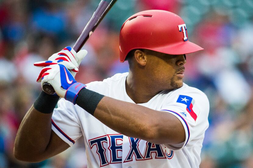 Texas Rangers third baseman Adrian Beltre (29) bats during the second inning of an MLB game...