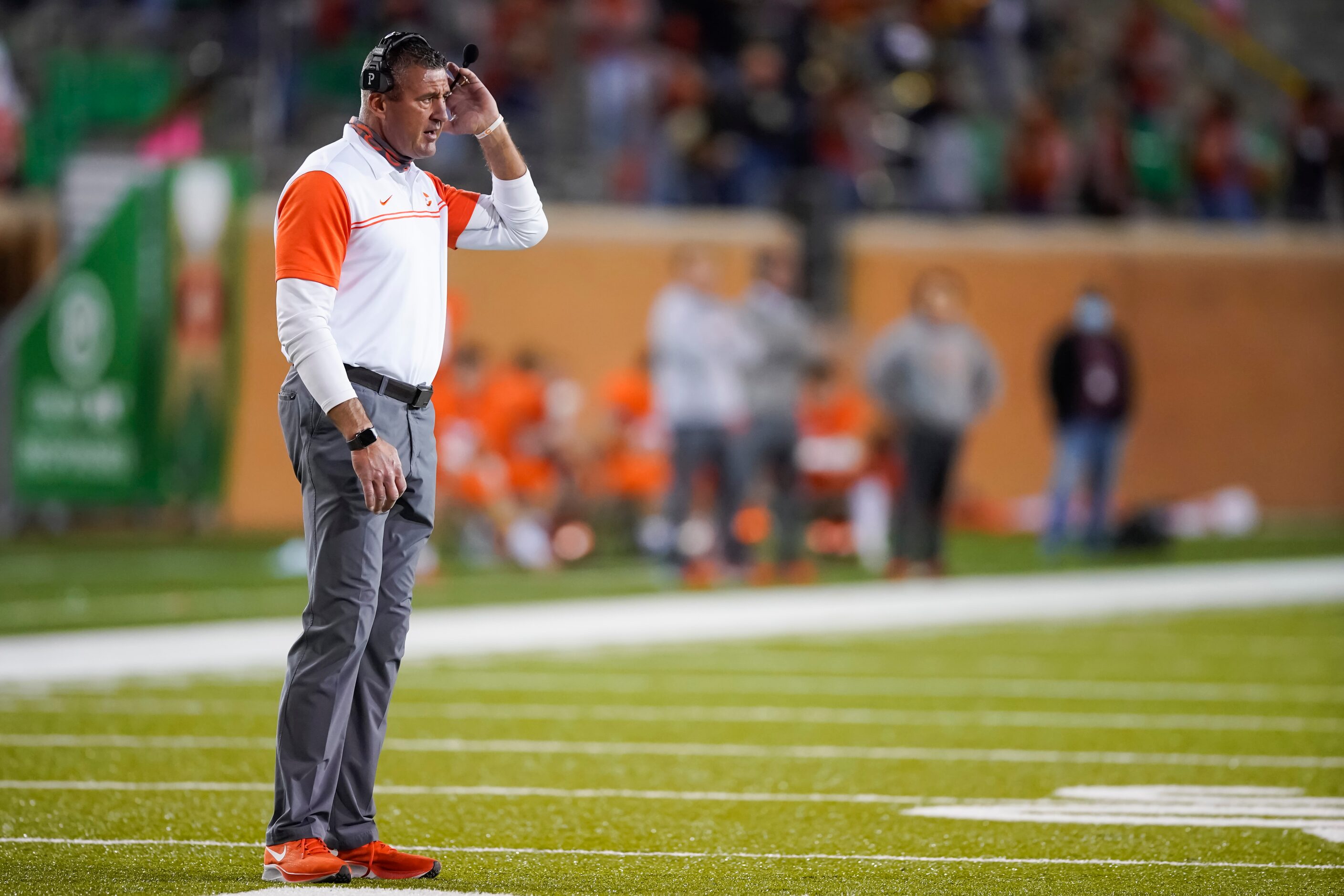 Celina head coach Bill Elliott listens for a call by officials during the second quarter of...