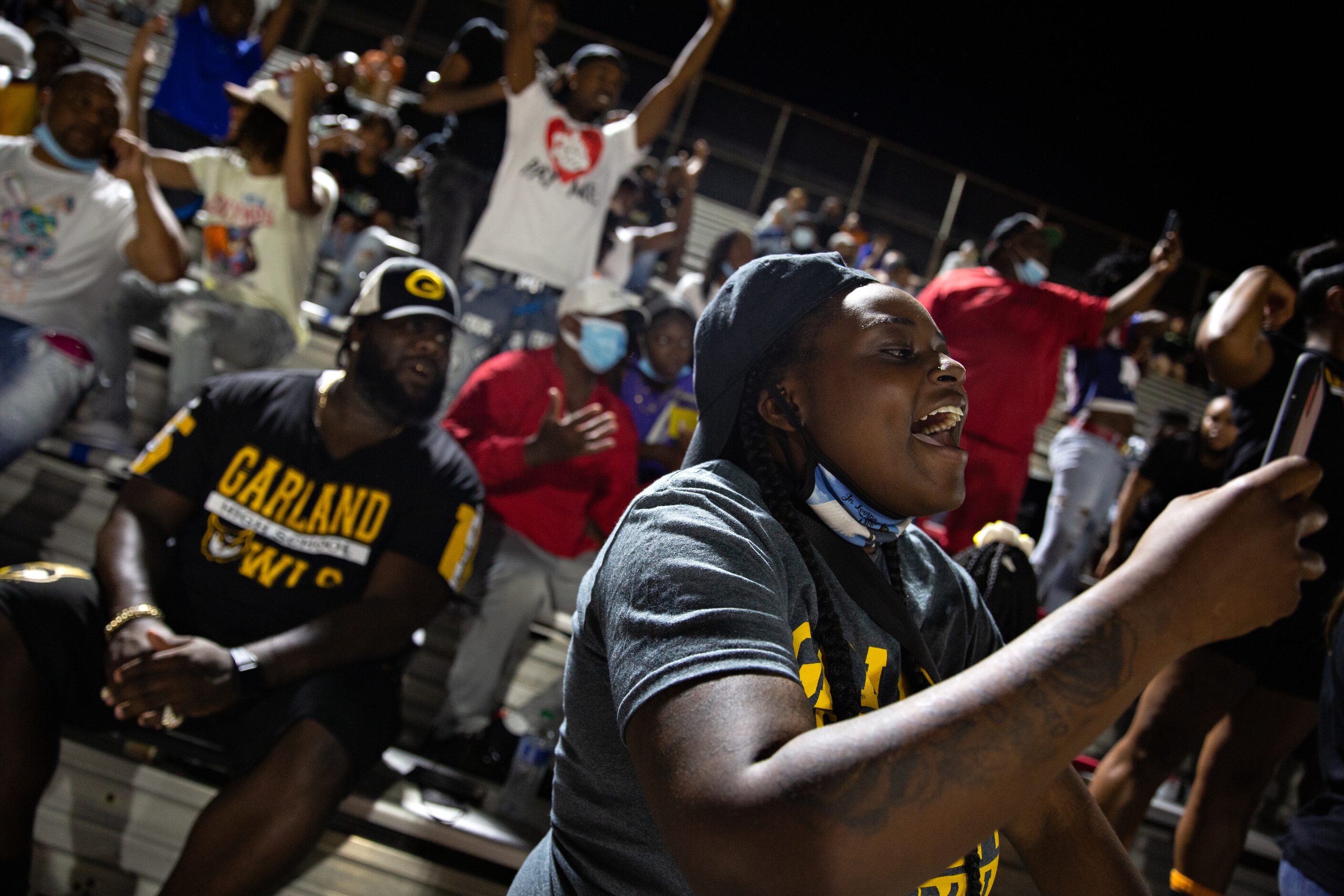 Joichelle Parmer cheers after a touchdown at Sprague Stadium during the season-opening game...