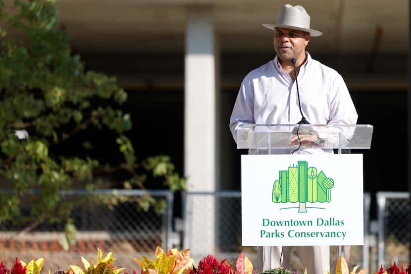 Dallas Mayor Eric Johnson speaks during the opening ceremony of Harwood Park in downtown...