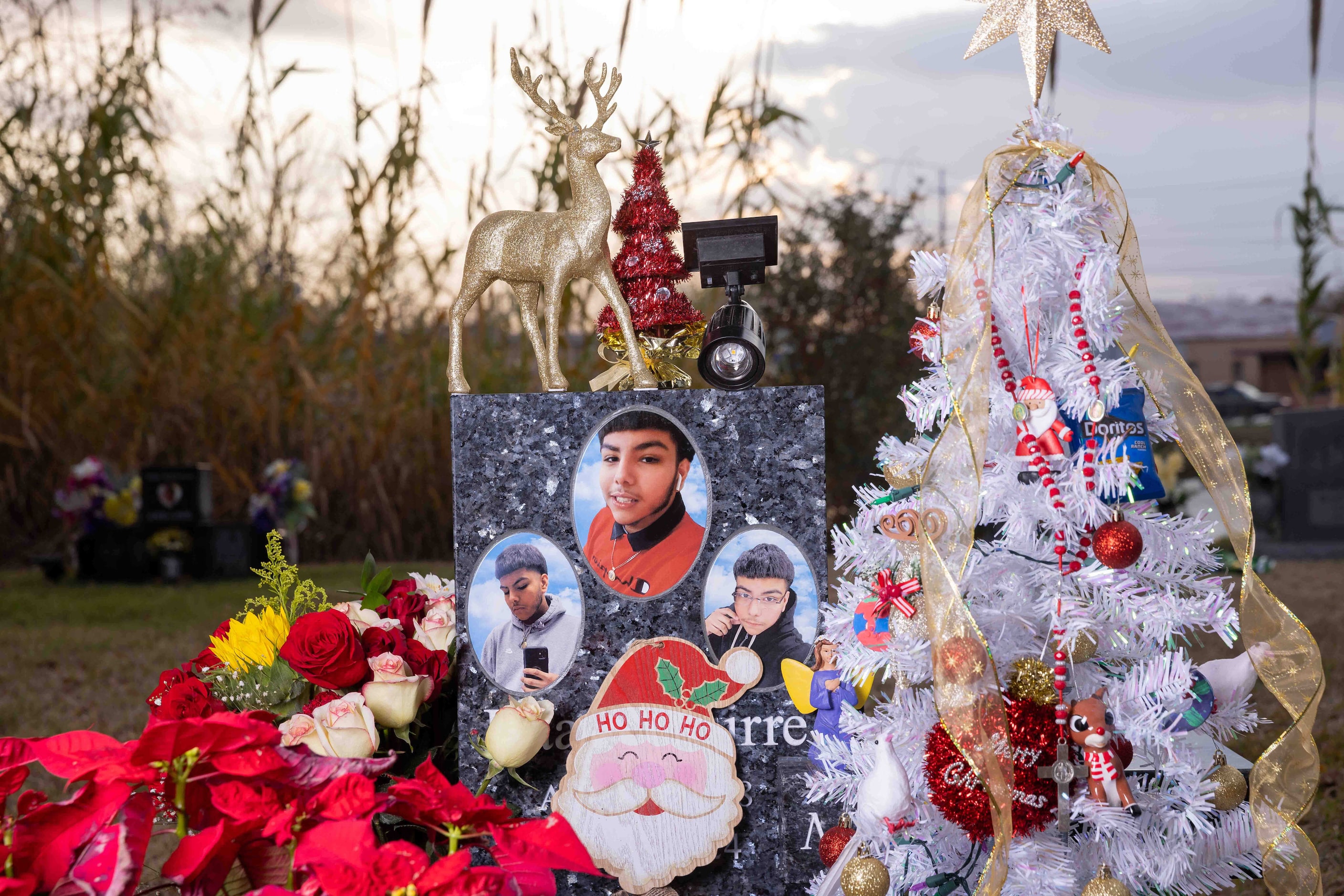 Isaac Aguirre’s gravesite decorated for Christmas at Grove Hill Memorial Cemetery in Dallas...