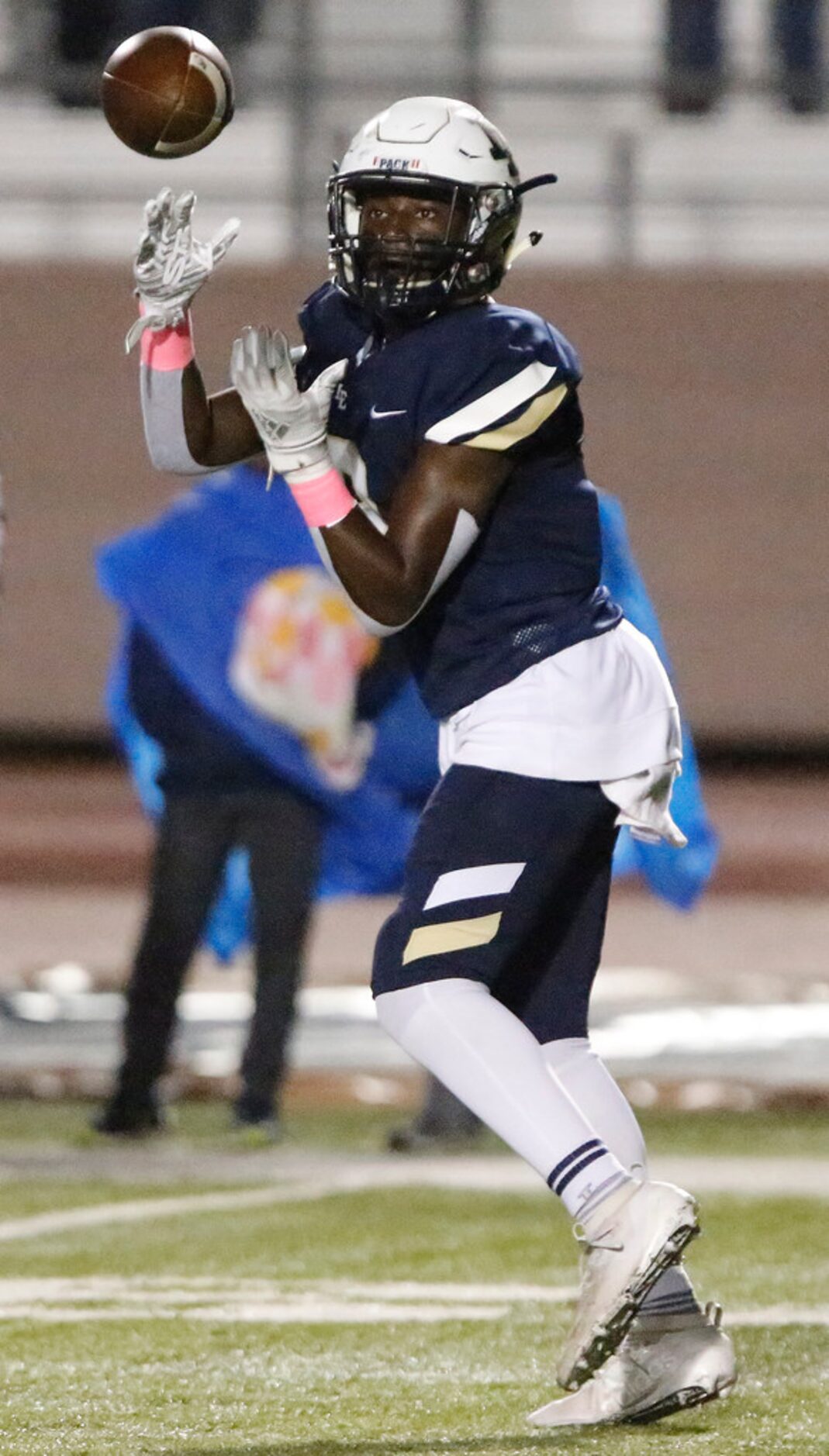 Little Elm High School running back Vashawn Thomas (2) pulls in a pass during the first half...