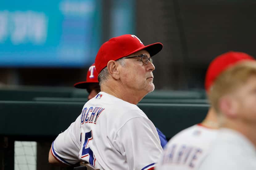 Texas Rangers manager Bruce Bochy (15) is seen in the dugout during the ninth inning of a...