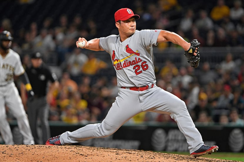 PITTSBURGH, PA - SEPTEMBER 23:  Seung-Hwan Oh #26 of the St. Louis Cardinals delivers a...