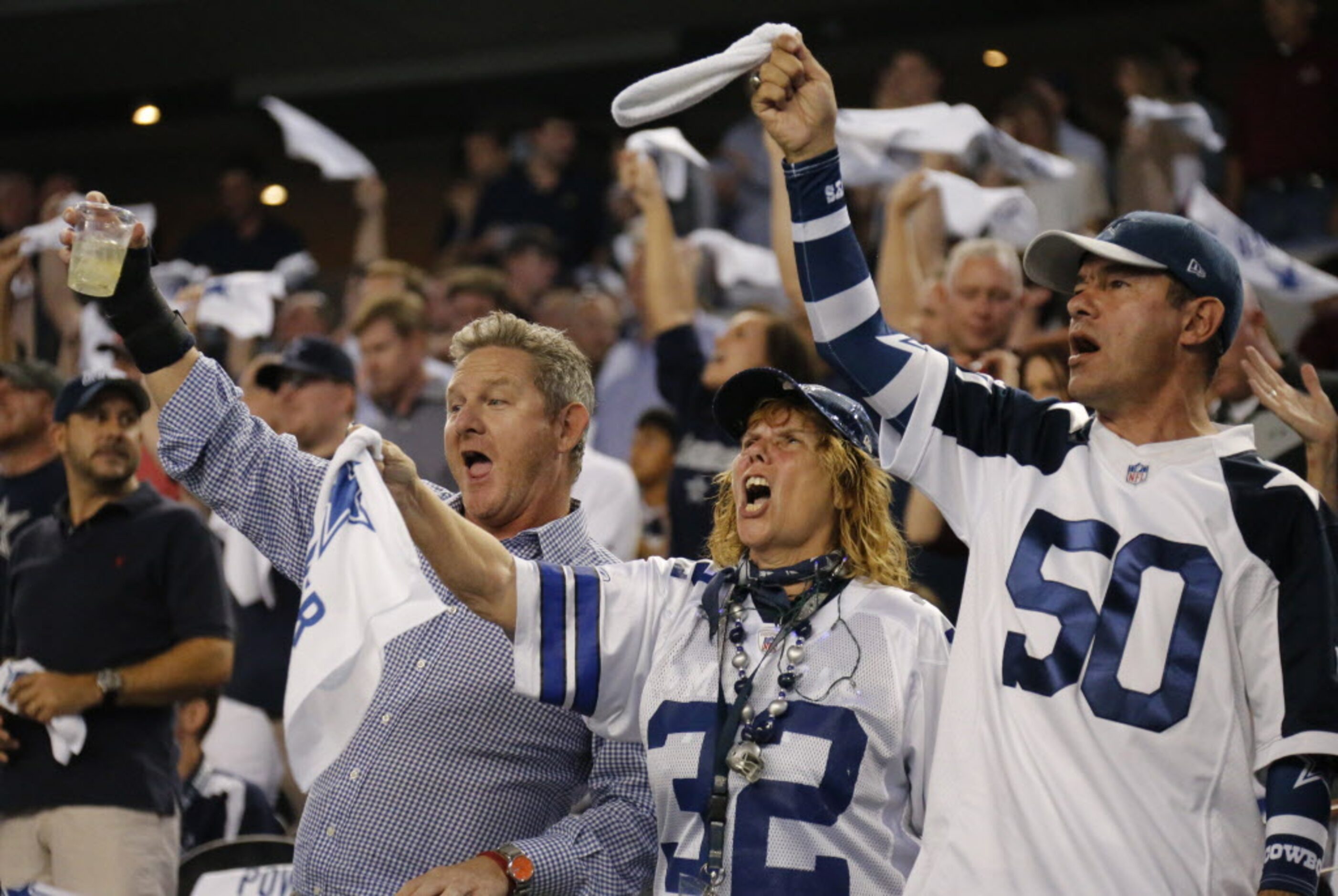 Dallas fans get pumped up for the opening kickoff during the Washington Redskins vs. the...