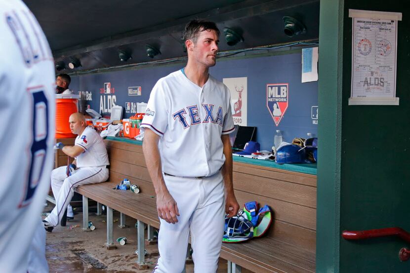 Texas Rangers starting pitcher Cole Hamels (35) walks to the dugout tunnel after a difficult...
