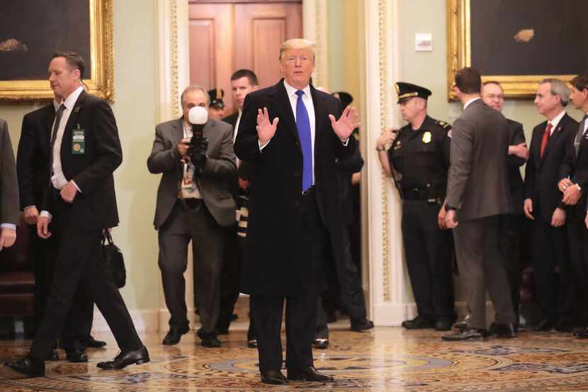 President Donald Trump leaves after joining Senate Republicans for their weekly policy...