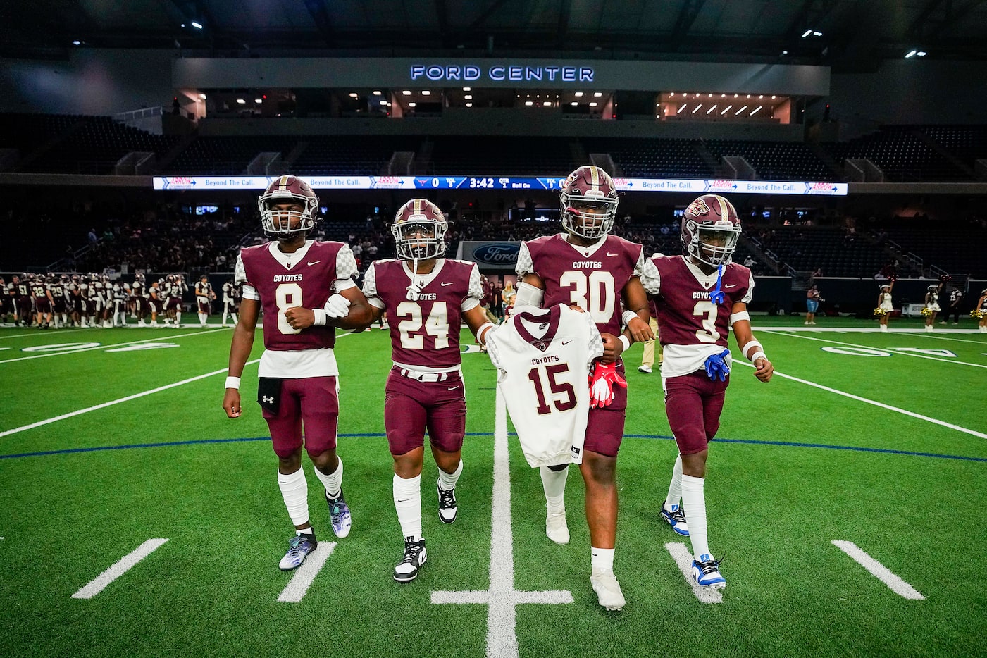 Frisco Heritage quarterback Jiyere Cogshell (8), linebacker Diego Gonzalez (24), defensive...