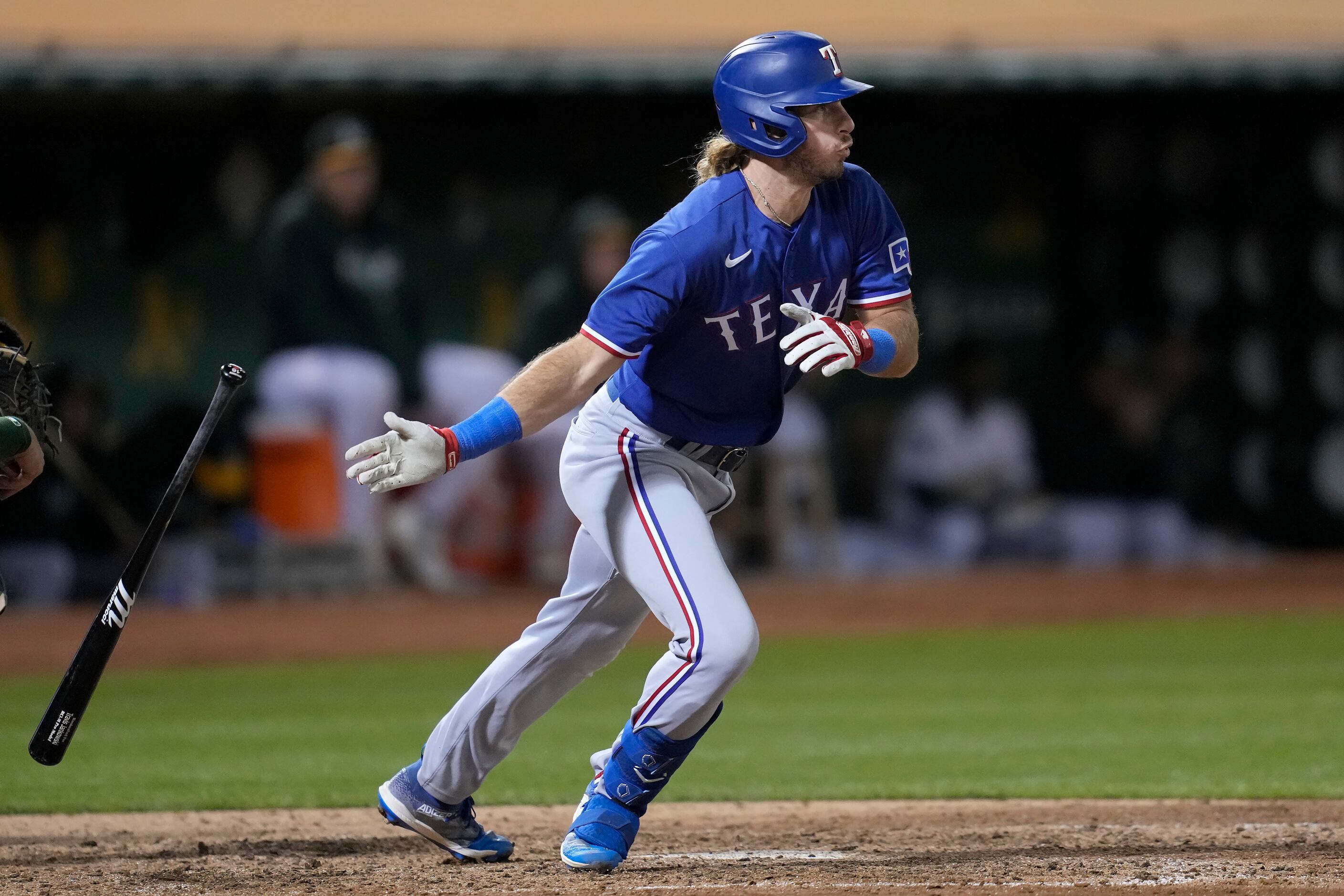 Texas Rangers' Travis Jankowski celebrates after advancing to