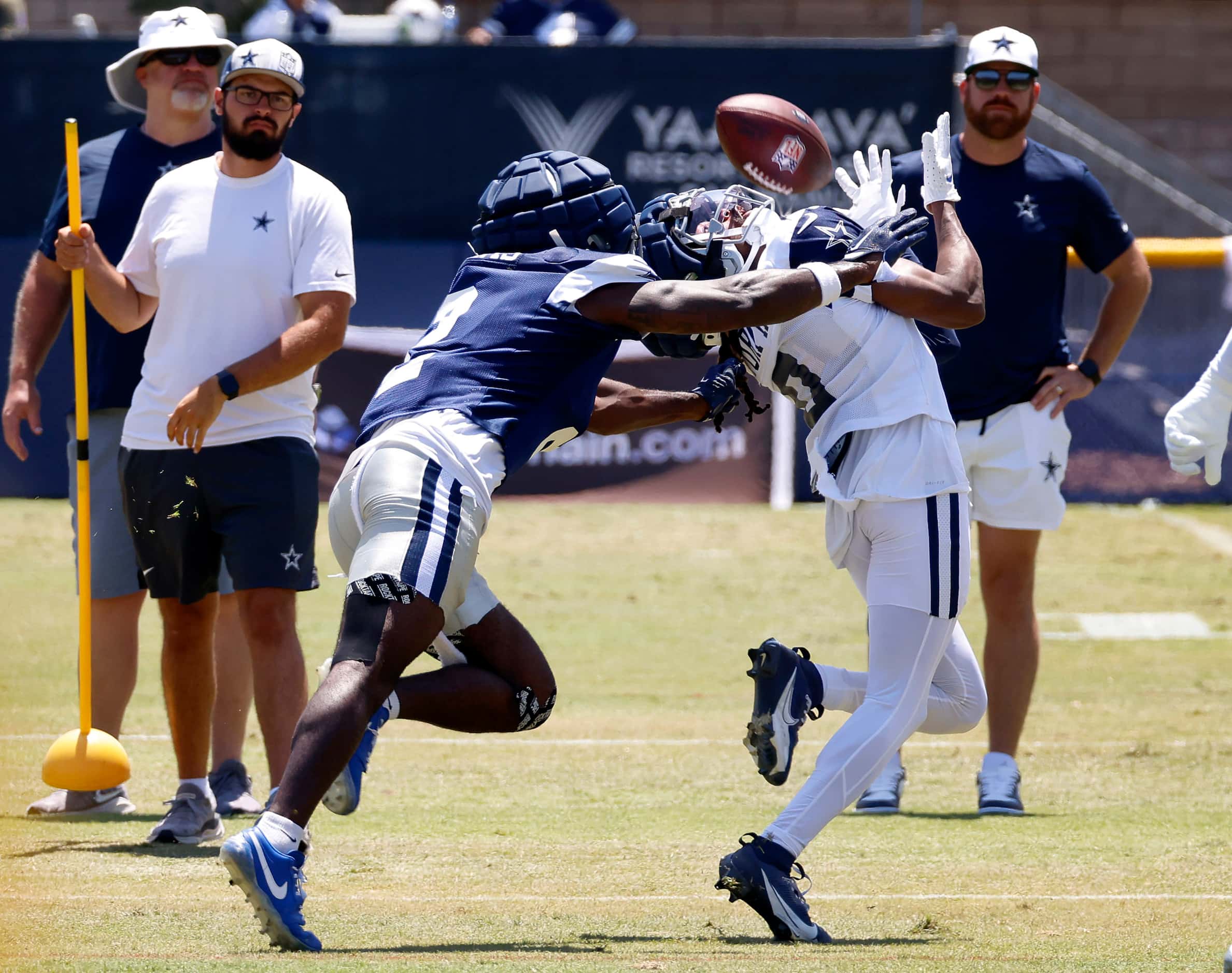 Dallas Cowboys wide receiver KaVontae Turpin (9) looks over his shoulder for a pass as he’s...