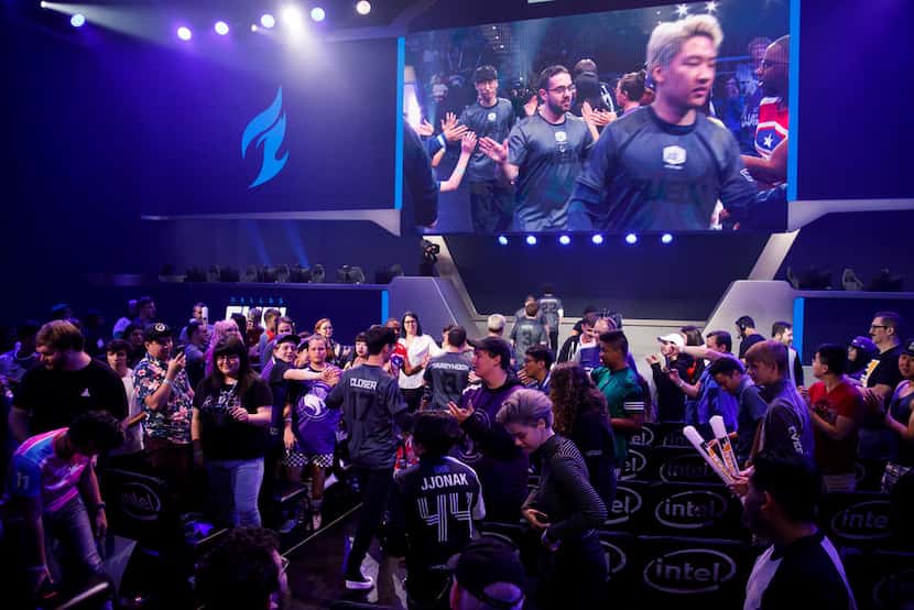 The Dallas Fuel team walks out for the Overwatch League match between the Dallas Fuel and LA...