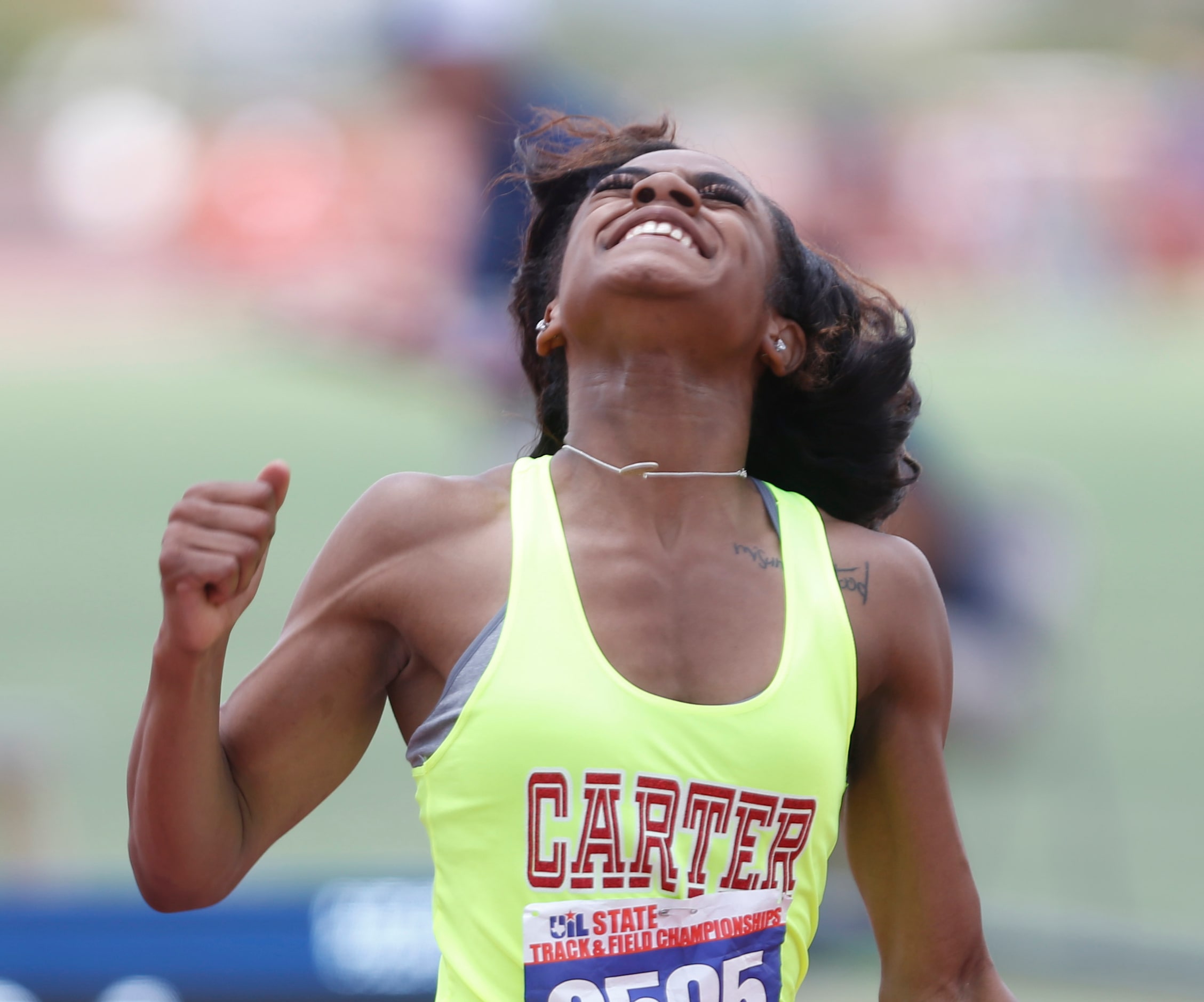 Dallas Carter's Sha'Carri Richardson celebrates after winning the Class 4A girls 100-meter...