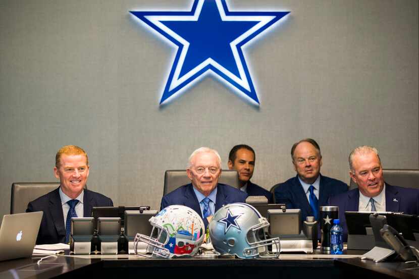 Dallas Cowboys Owner Jerry Jones, center, Head Coach Jason Garrett, left, CEO and Executive...