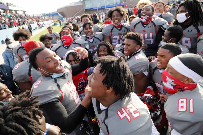 Cedar Hill High School free safety Kendall Stevens (2) leads his team in a victory cheer...