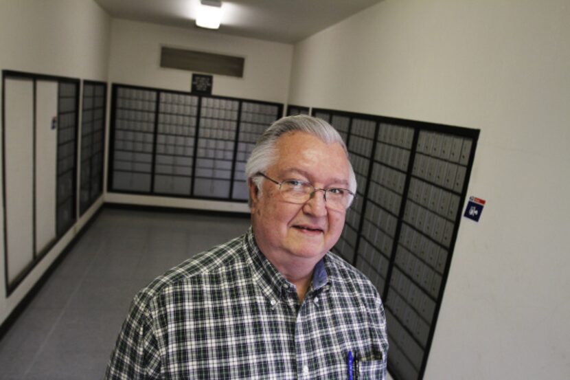 Harold Magill, a Seagoville city council member, stands in the Seagoville branch of the...