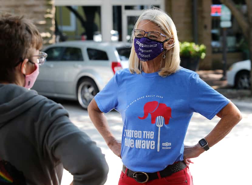 Sharon Hirsch, a Democratic candidate for the Texas House, talks with a volunteer during a...