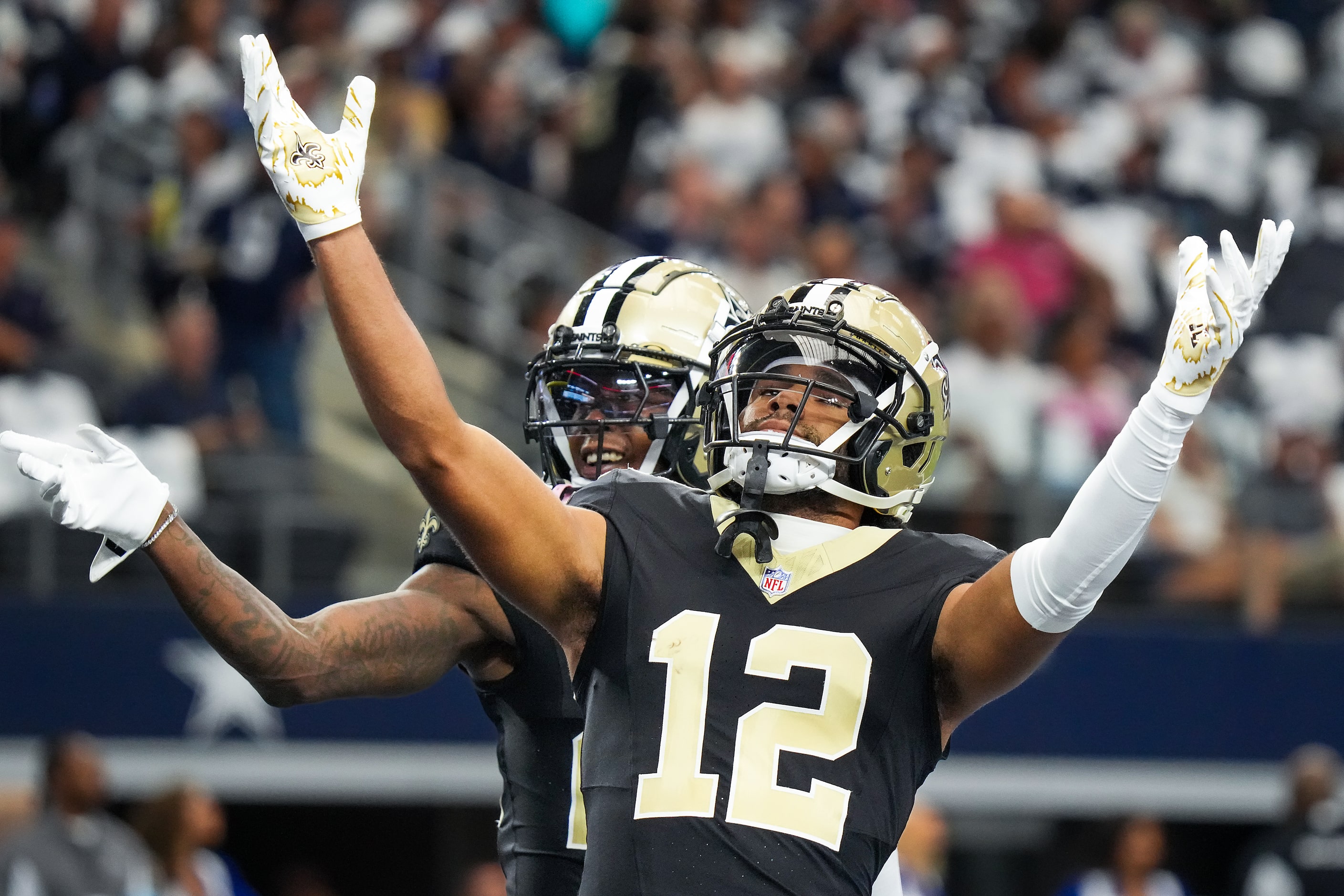 New Orleans Saints wide receiver Rashid Shaheed (22) celebrates with wide receiver Chris...