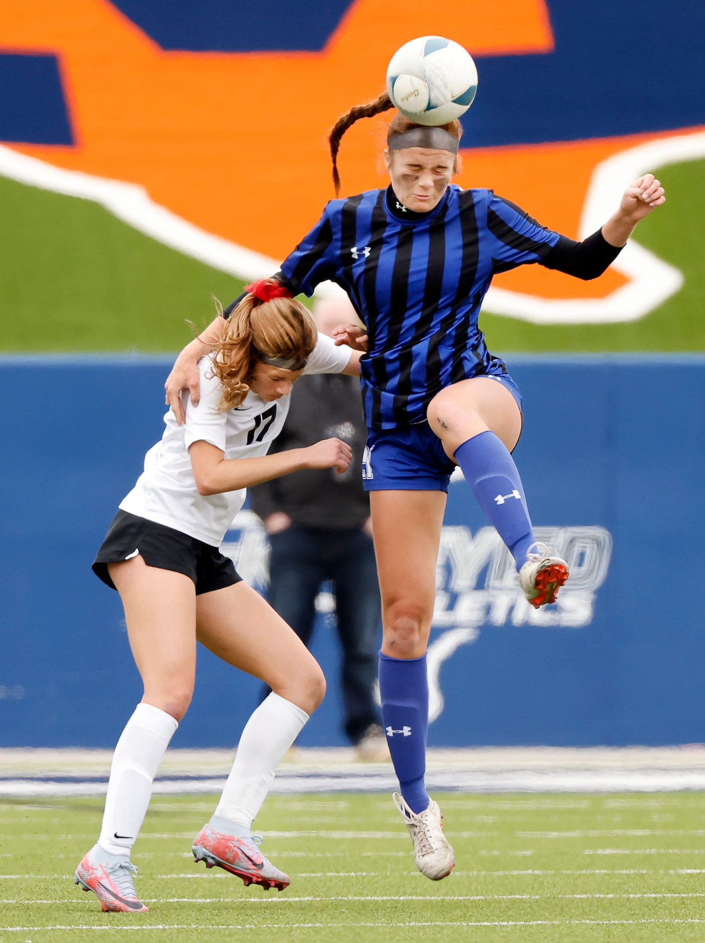 Flower Mound Marcus forward Madi Patterson (17) and Trophy Club Byron Nelson forward Tina...