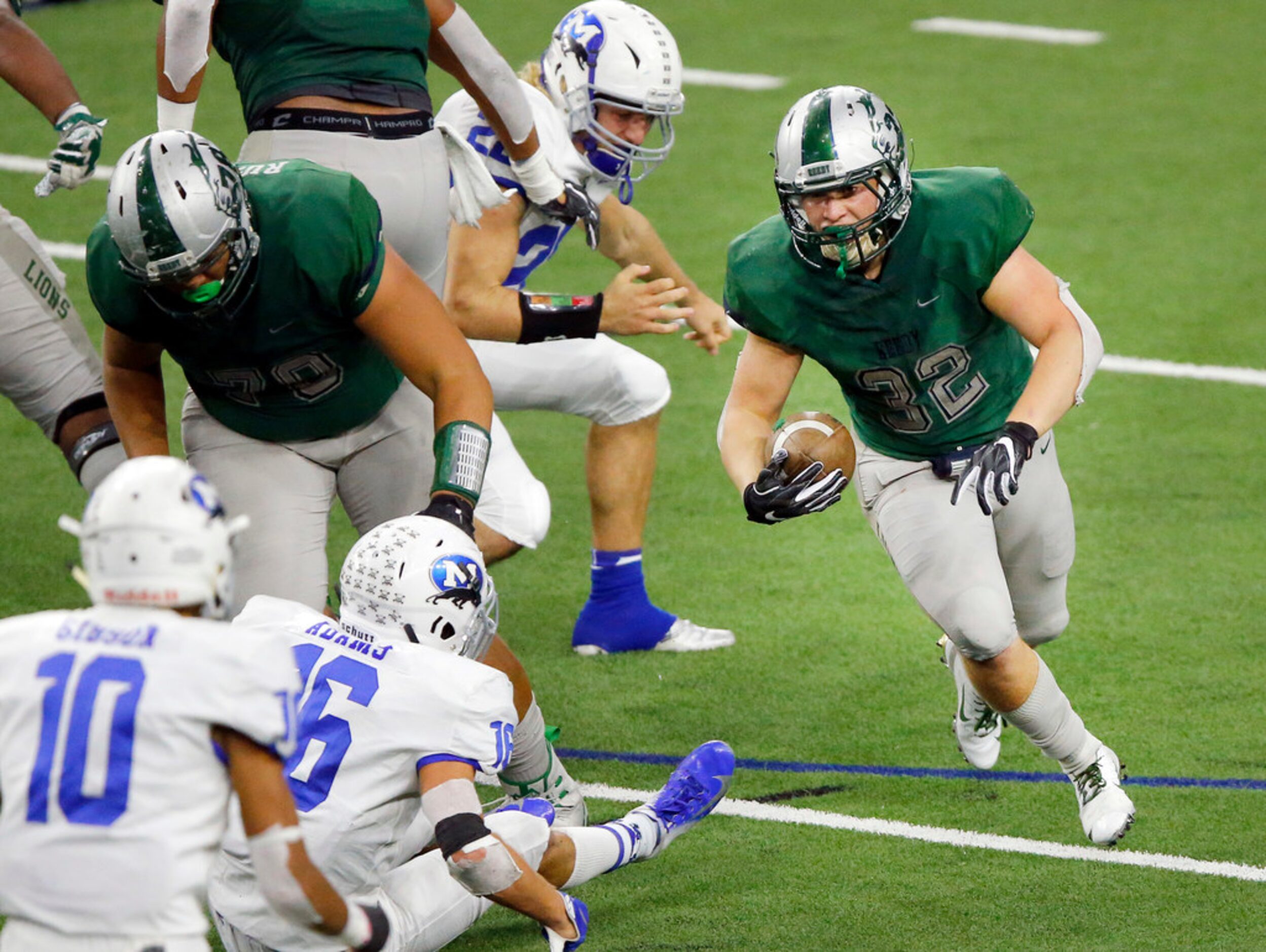 Frisco Reedy running back Michael Ferrara (32) carries the ball against Midlothian in the...