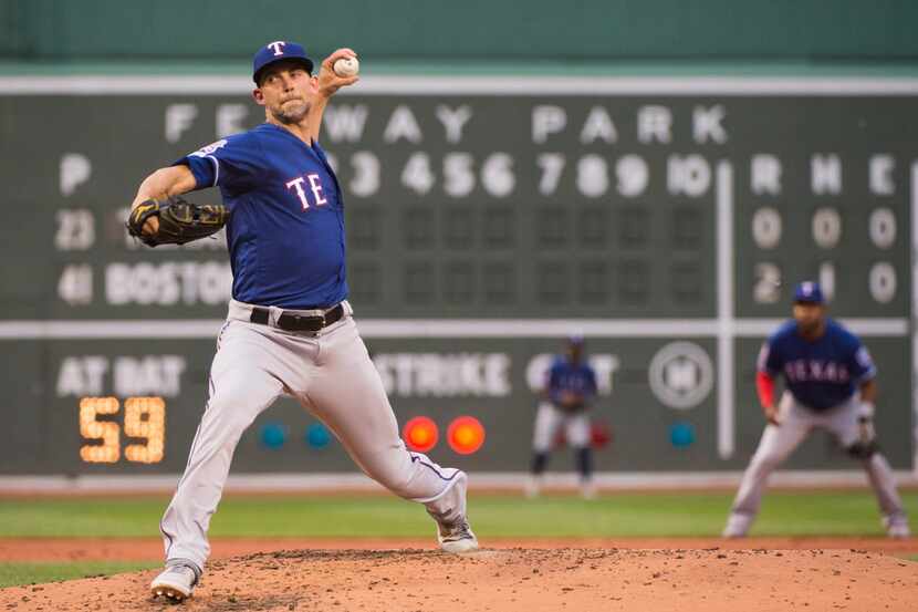 BOSTON, MA - JUNE 10: Mike Minor #23 of the Texas Rangers pitches against the Boston Red Sox...