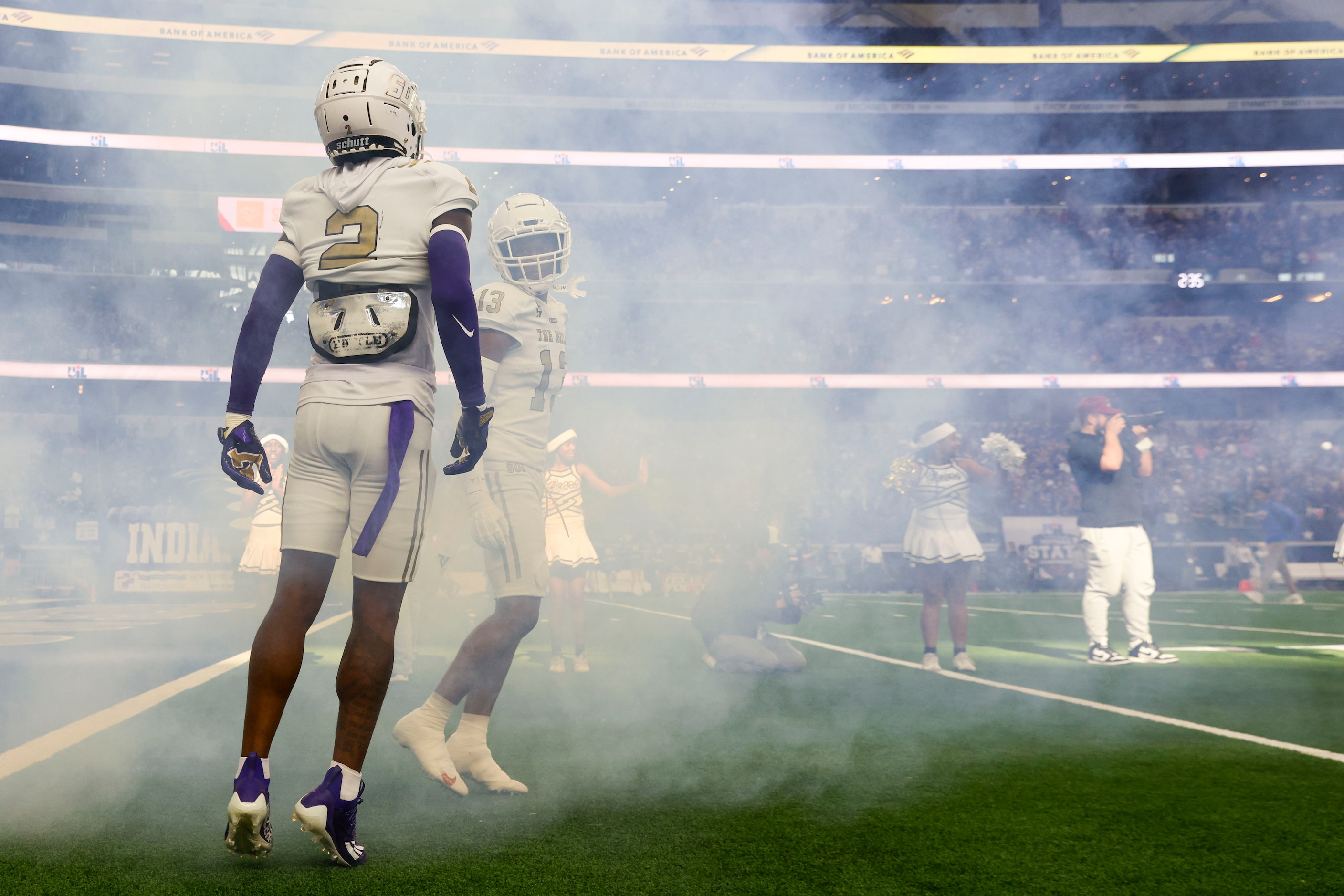 South Oak Cliff players take the field ahead of their Class 5A Division II state...