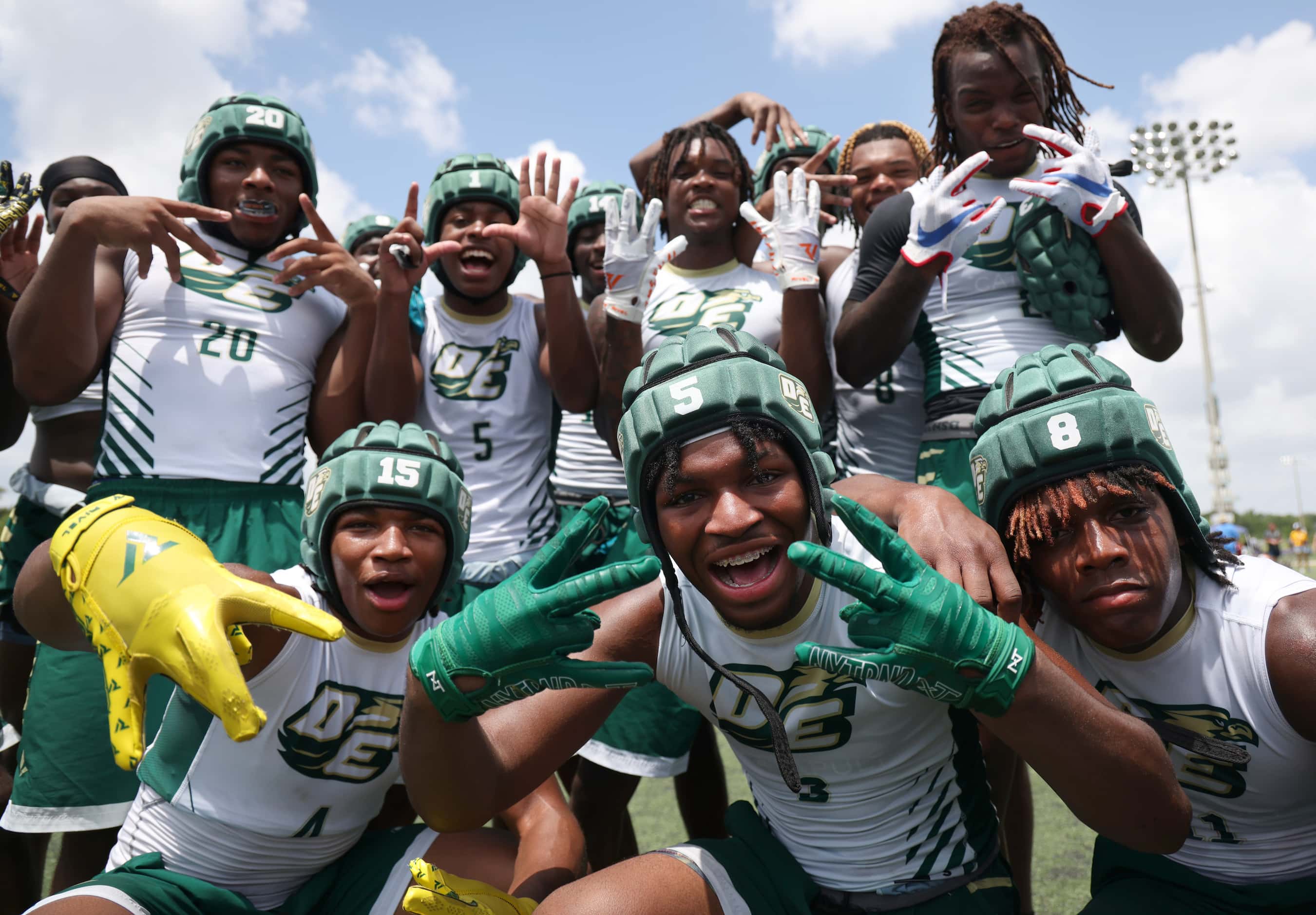 DeSoto Eagles players mug for the camera following their 38-20 victory over Austin Anderson...
