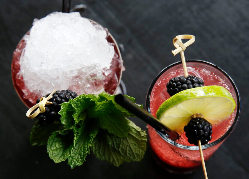 The Blackbird Julep and the Blackberry Shrub Cooler, photographed at The Standard Pour in...