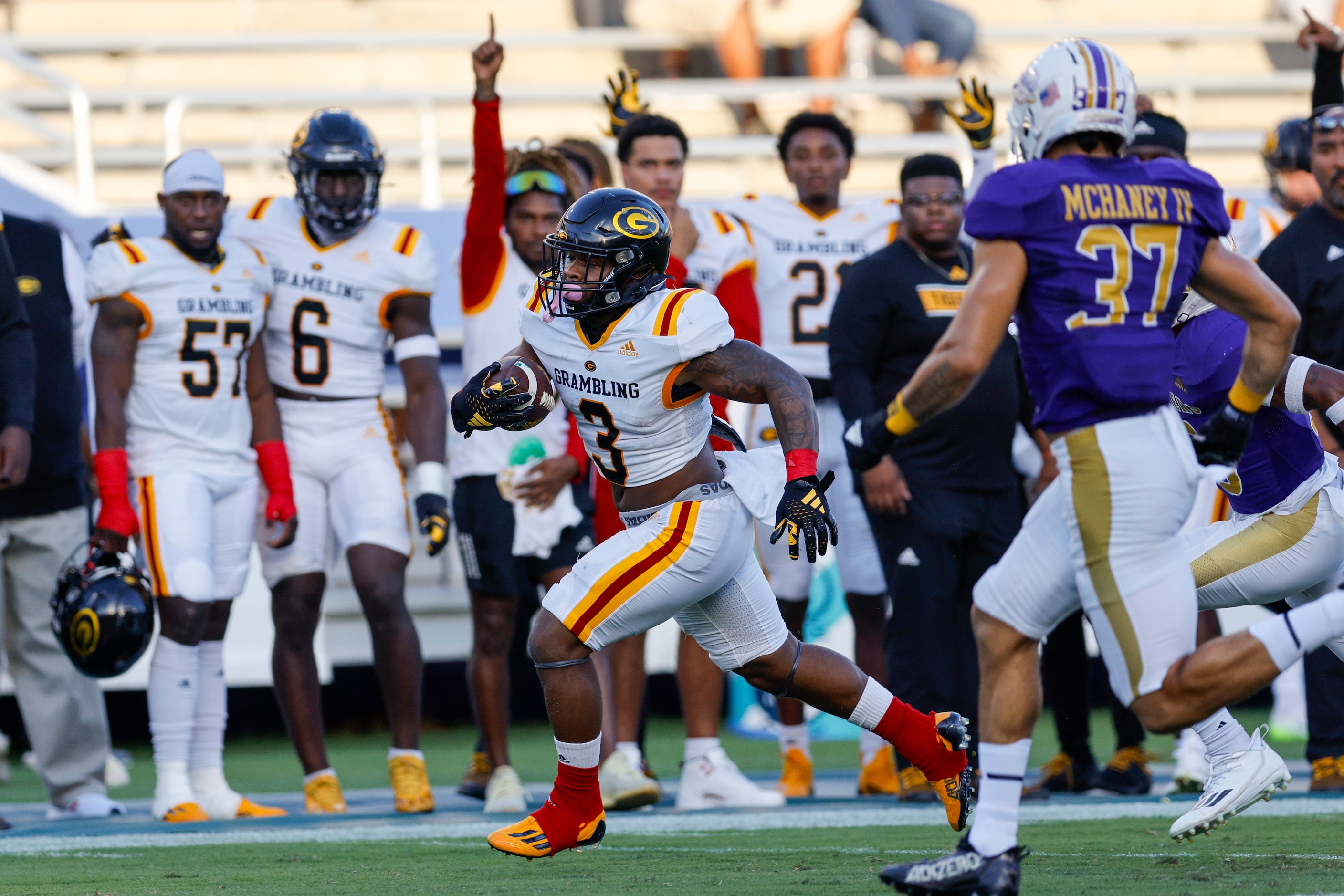 Grambling State running back Floyd Chalk IV (3) runs the ball past Prairie View A&M...