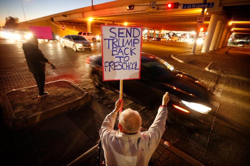 Supporters of U.S. Representative Colin Allred, including Ralph Secketa, 80, gathered...