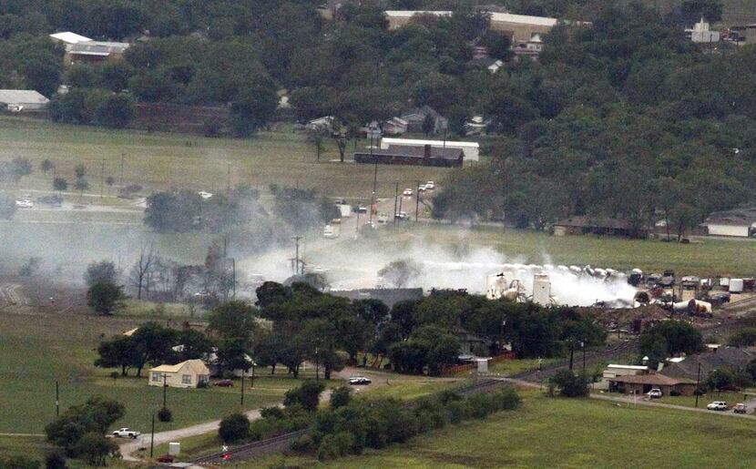 Smoke rises from a neighborhood following Wednesday's explosion in West, Texas.
