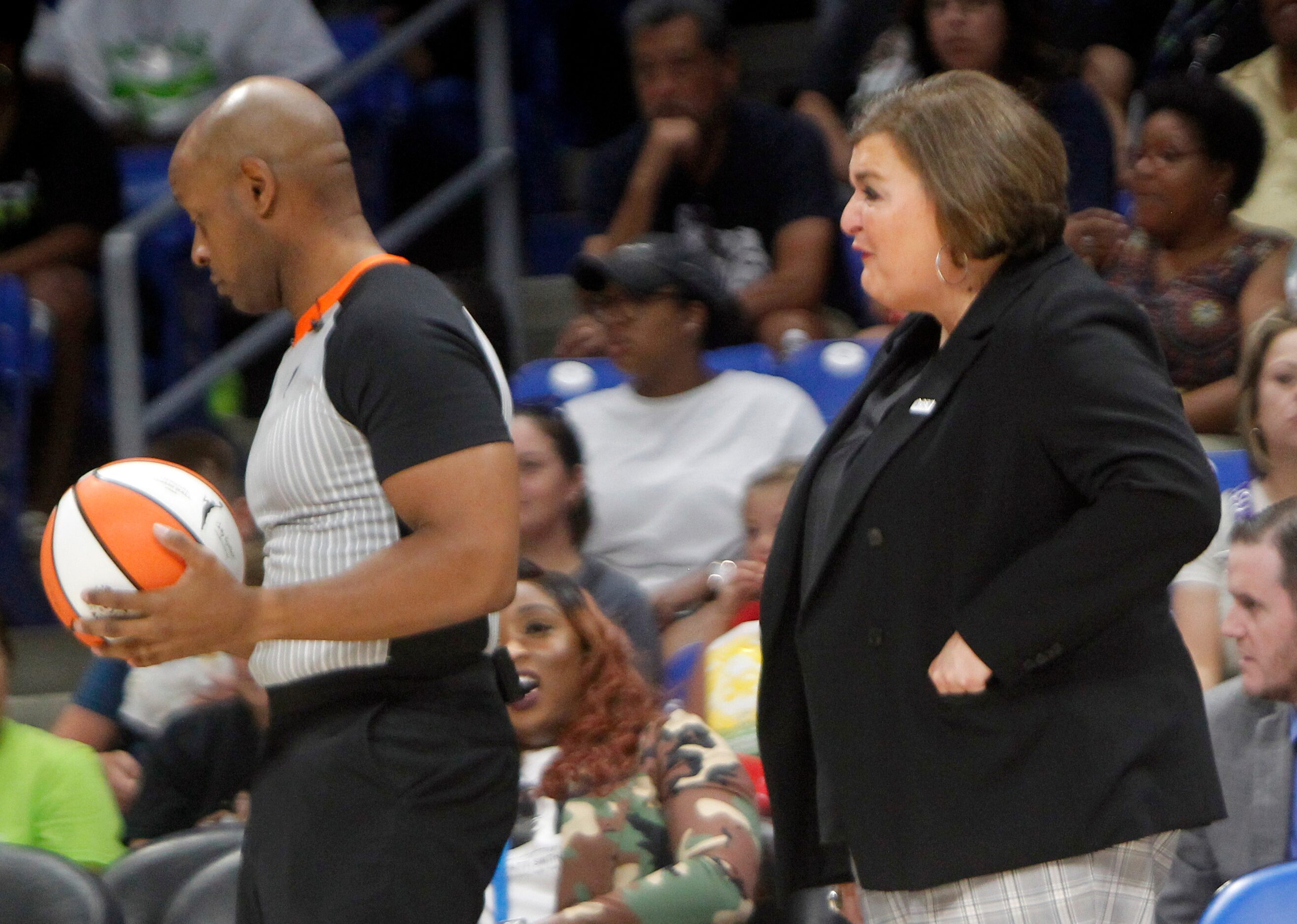 Dallas Wings head coach Latricia Trammell shows frustration with a game official during...