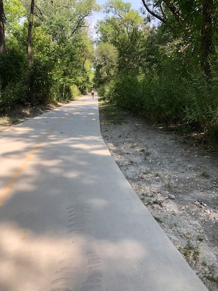 Lake Highlands trail runs along mature trees on the southern border of the Royal Highlands...