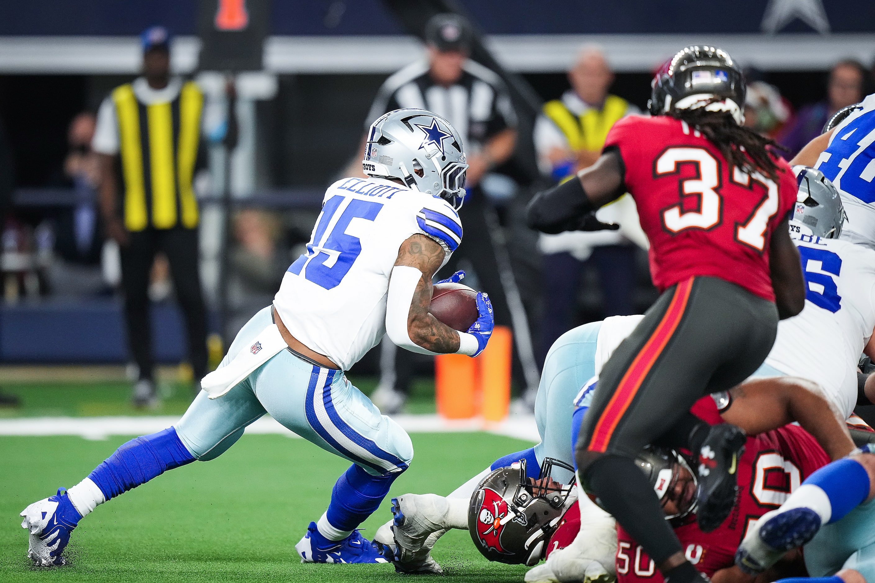 Dallas Cowboys running back Ezekiel Elliott (15) scores on a one-yard touchdown  run during...