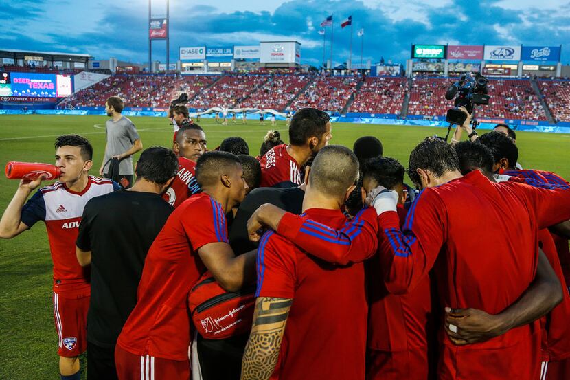 FC Dallas huddles together before the soccer game between FC Dallas and Orlando City SC at...