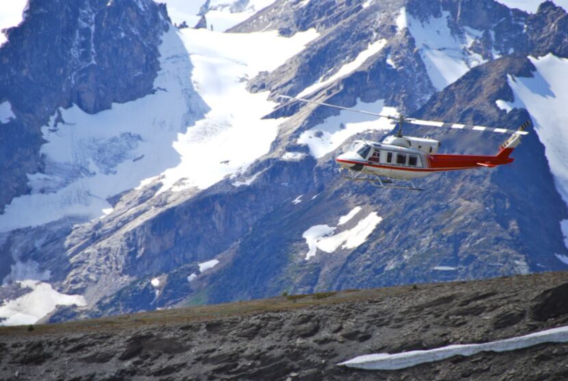 A Bell 212 helicopter flies hikers to a different destination each day in the remote Purcell...