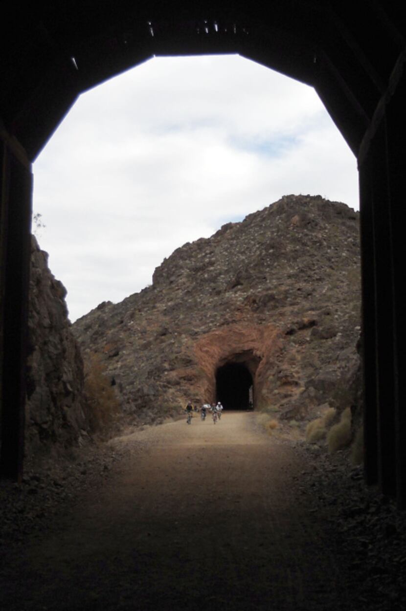A spur off the loop leads onto the Historic Railroad Tunnel Trail, which runs through...