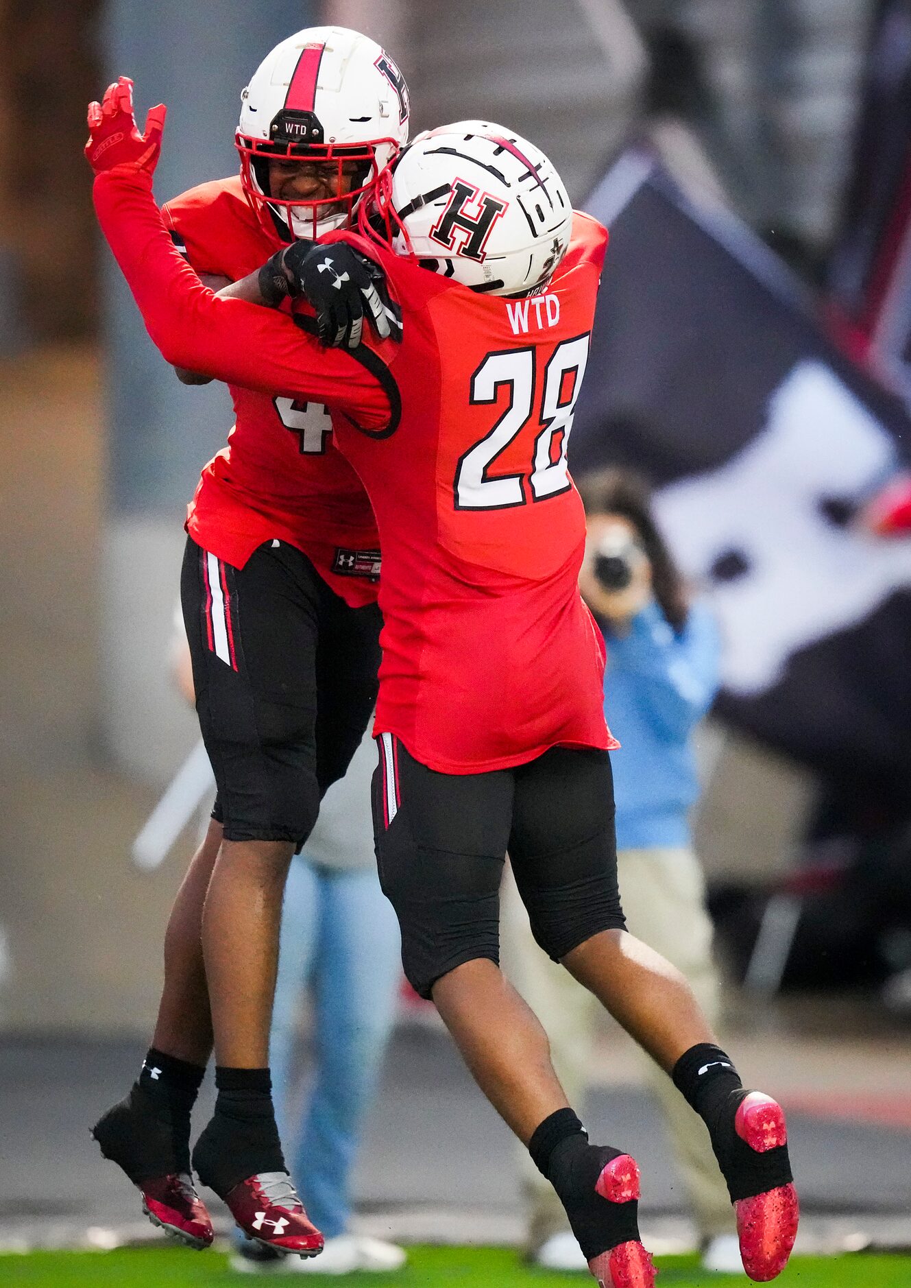 Rockwall-Heath linebacker Jayden Lexion (41) celebrates with linebacker Taurus Noles (28)...